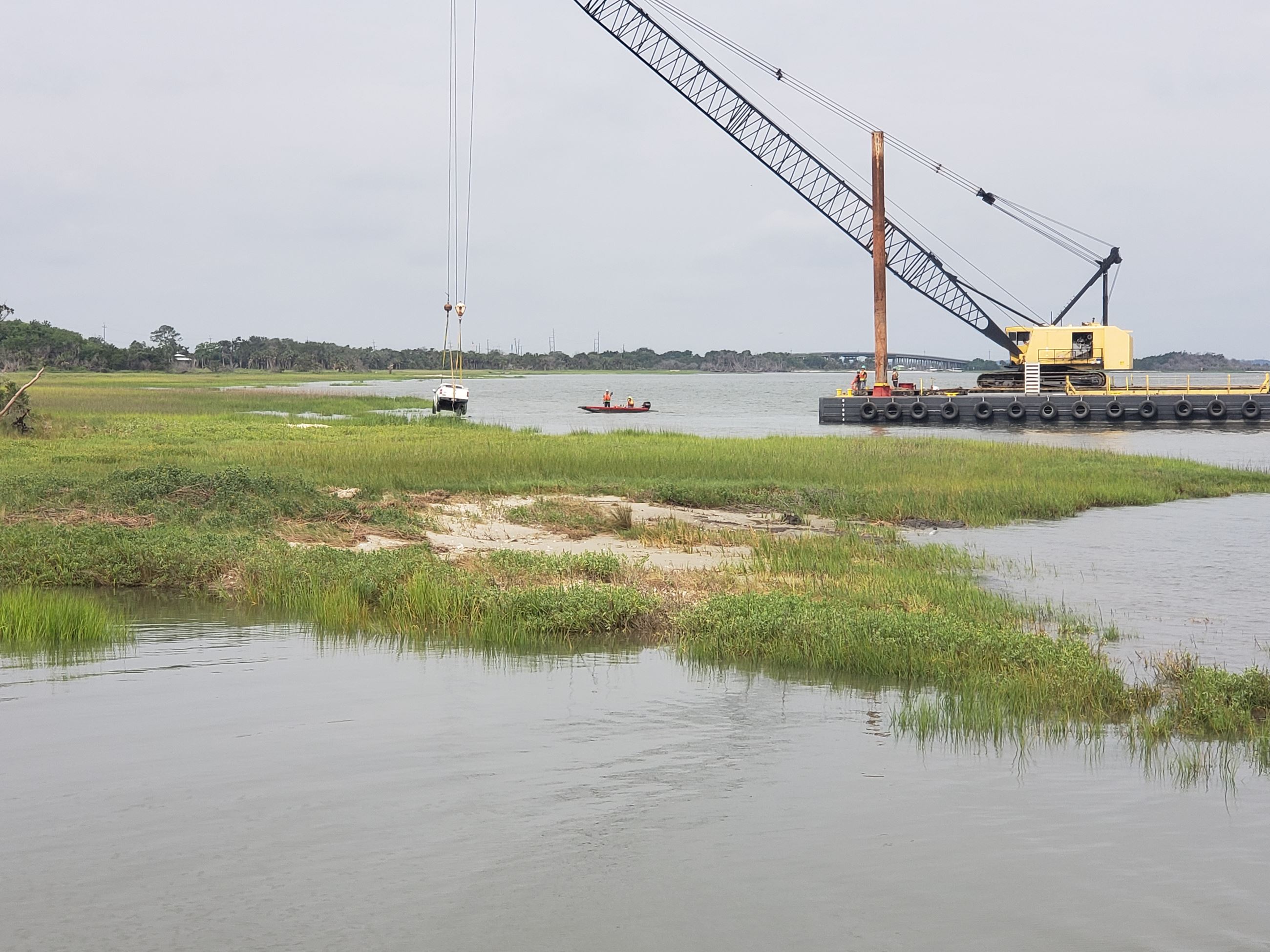 20190606 Pickup being lifted from muck